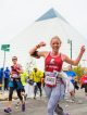 Woman in front of the Pyramid running in the St. Jude marathon.