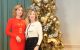 Supporters pose beside a gilded Christmas tree at the 2023 St. Jude Houston Christmas Luncheon. 